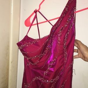 Pink one-shoulder dress.